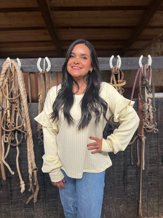 Chaleco con vuelos beige